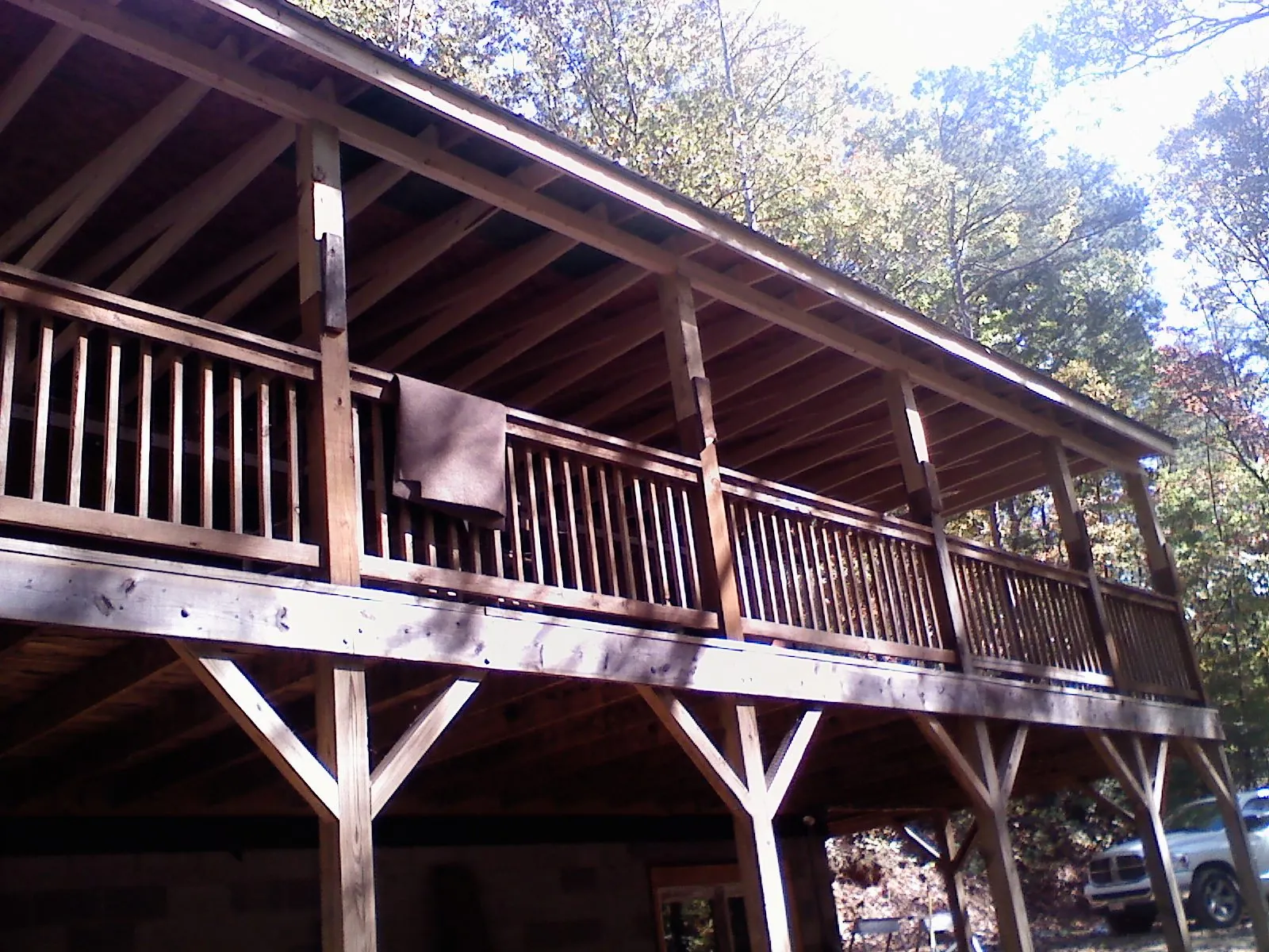 Timber framing under a new elevated porch and deck — Roof Leak Repair in Onaga by Roofing Brothers